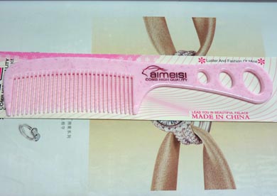 时尚流行带孔长把梳（2243）