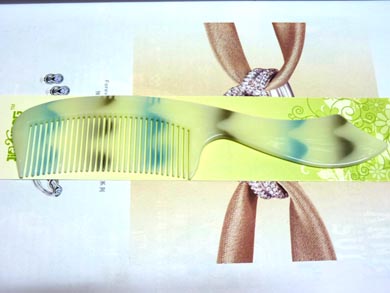 时尚刀把仿玉梳子