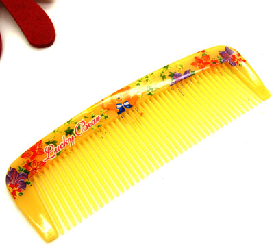 可爱彩色梳 卷发梳 家用头梳 直发梳 洗澡梳 化妆梳----仿牛角印花把梳