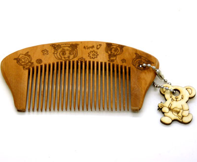 时尚发梳 耐热防静电 家用梳  日用梳----桃木挂件月梳