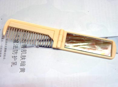 可爱卡通伸展按摩带镜梳（...